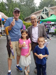 George with constituents at a community event in the summer